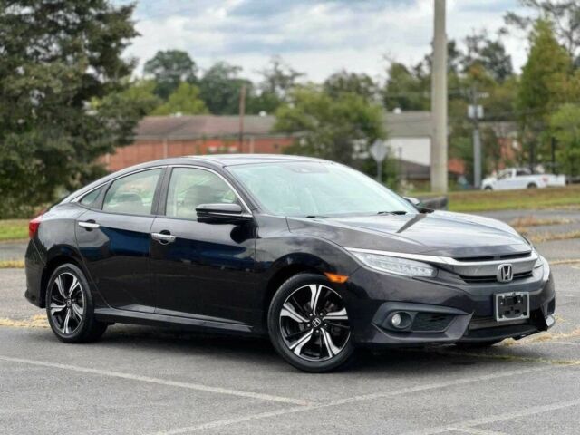 Чорний Хонда Сівік, об'ємом двигуна 1.5 л та пробігом 50 тис. км за 8800 $, фото 1 на Automoto.ua