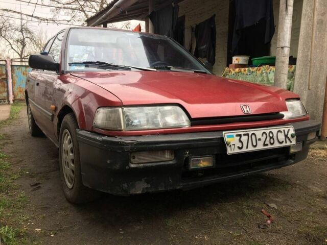 Красный Хонда Цивик, объемом двигателя 1.3 л и пробегом 200 тыс. км за 600 $, фото 1 на Automoto.ua
