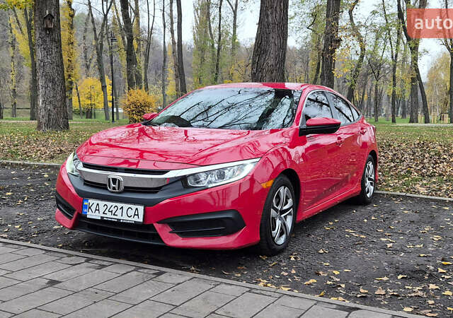 Красный Хонда Цивик, объемом двигателя 2 л и пробегом 119 тыс. км за 14400 $, фото 1 на Automoto.ua