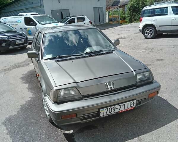 Серый Хонда Цивик, объемом двигателя 1.4 л и пробегом 300 тыс. км за 1399 $, фото 1 на Automoto.ua