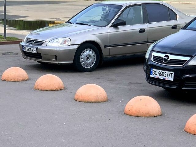 Серый Хонда Цивик, объемом двигателя 1.6 л и пробегом 373 тыс. км за 4000 $, фото 1 на Automoto.ua