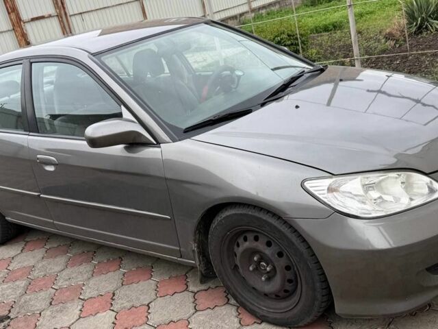 Серый Хонда Цивик, объемом двигателя 1.7 л и пробегом 145 тыс. км за 1800 $, фото 1 на Automoto.ua