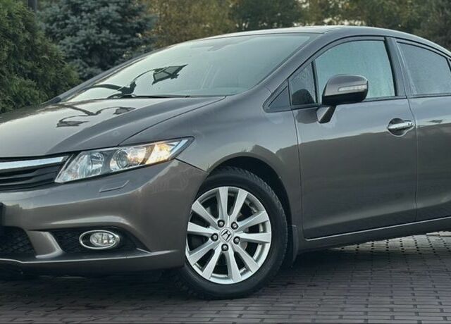 Серый Хонда Цивик, объемом двигателя 1.8 л и пробегом 225 тыс. км за 9200 $, фото 1 на Automoto.ua