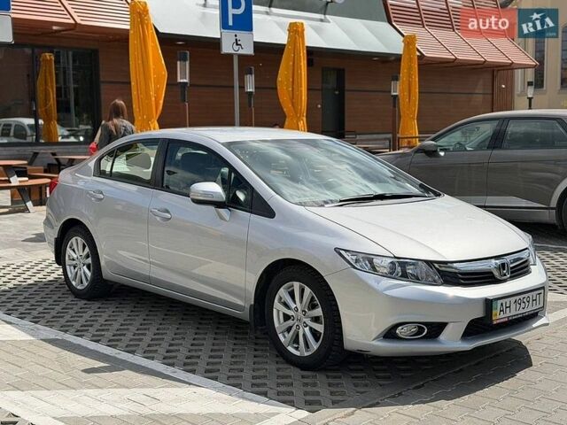 Серый Хонда Цивик, объемом двигателя 1.8 л и пробегом 62 тыс. км за 12950 $, фото 1 на Automoto.ua