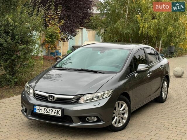 Серый Хонда Цивик, объемом двигателя 1.8 л и пробегом 175 тыс. км за 11400 $, фото 1 на Automoto.ua