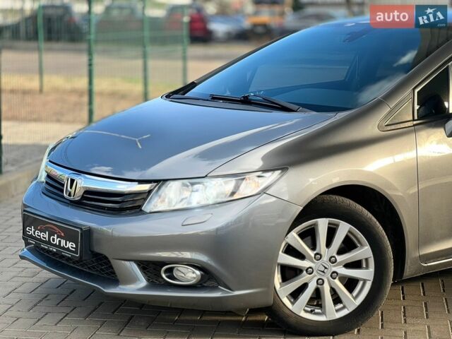 Серый Хонда Цивик, объемом двигателя 1.8 л и пробегом 188 тыс. км за 9899 $, фото 1 на Automoto.ua