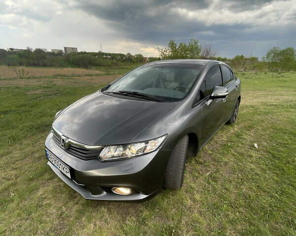 Серый Хонда Цивик, объемом двигателя 1.6 л и пробегом 107 тыс. км за 10000 $, фото 1 на Automoto.ua