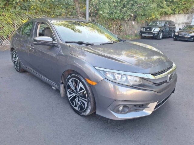 Серый Хонда Цивик, объемом двигателя 1.5 л и пробегом 74 тыс. км за 6900 $, фото 1 на Automoto.ua