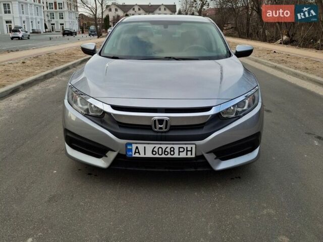 Серый Хонда Цивик, объемом двигателя 2 л и пробегом 142 тыс. км за 12400 $, фото 1 на Automoto.ua
