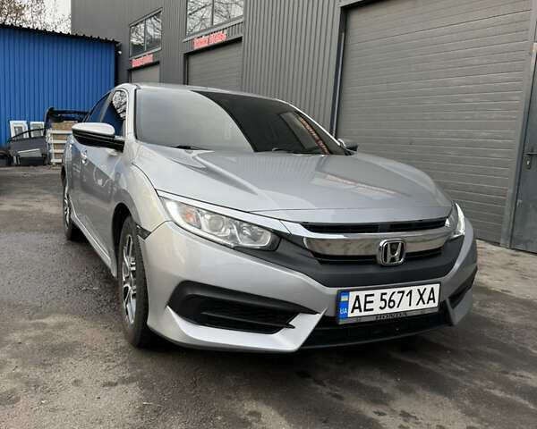 Серый Хонда Цивик, объемом двигателя 2 л и пробегом 106 тыс. км за 12899 $, фото 1 на Automoto.ua