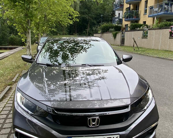 Серый Хонда Цивик, объемом двигателя 2 л и пробегом 68 тыс. км за 16800 $, фото 1 на Automoto.ua