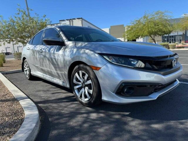 Серый Хонда Цивик, объемом двигателя 2 л и пробегом 118 тыс. км за 4400 $, фото 1 на Automoto.ua