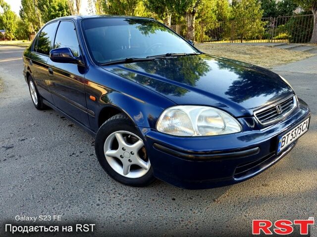 Синий Хонда Цивик, объемом двигателя 1.4 л и пробегом 245 тыс. км за 2500 $, фото 1 на Automoto.ua