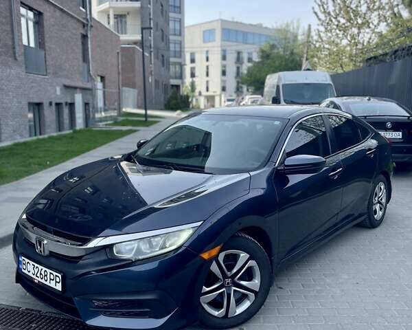 Синий Хонда Цивик, объемом двигателя 2 л и пробегом 147 тыс. км за 12700 $, фото 1 на Automoto.ua