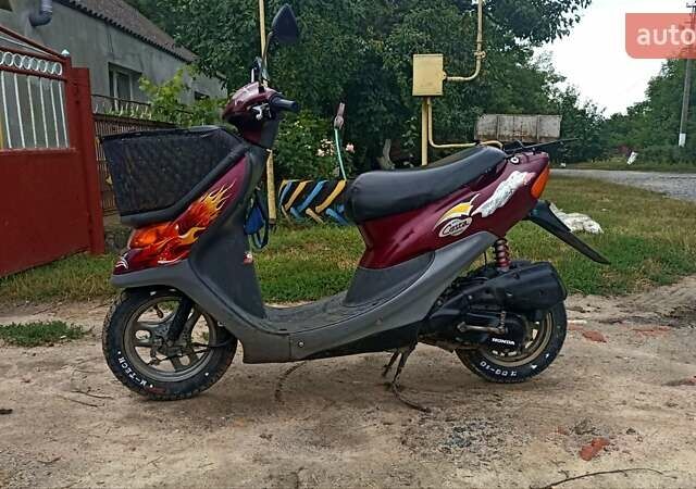 Красный Хонда Dio AF-34, объемом двигателя 49.9 л и пробегом 3 тыс. км за 400 $, фото 1 на Automoto.ua