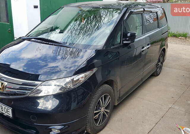 Черный Хонда Элизион, объемом двигателя 2.35 л и пробегом 151 тыс. км за 10700 $, фото 1 на Automoto.ua