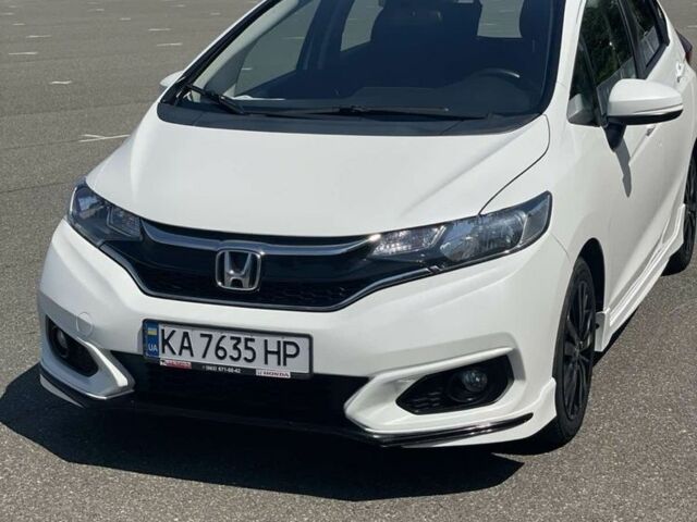 Білий Хонда ФІТ, об'ємом двигуна 1.5 л та пробігом 118 тис. км за 12994 $, фото 1 на Automoto.ua
