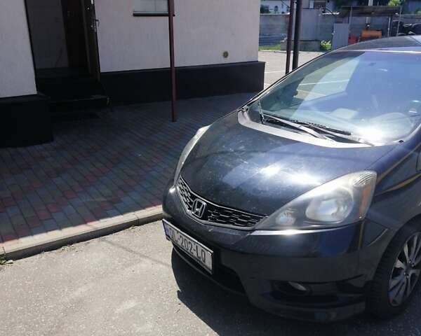 Черный Хонда ФИТ, объемом двигателя 1.4 л и пробегом 138 тыс. км за 4000 $, фото 1 на Automoto.ua