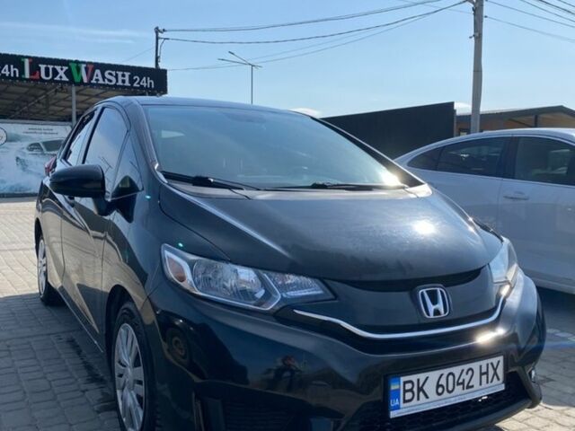 Чорний Хонда ФІТ, об'ємом двигуна 1.5 л та пробігом 80 тис. км за 9700 $, фото 1 на Automoto.ua