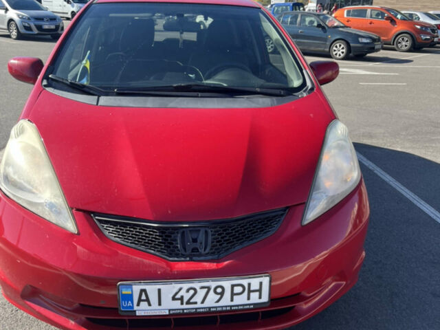 Червоний Хонда ФІТ, об'ємом двигуна 1.5 л та пробігом 200 тис. км за 5900 $, фото 1 на Automoto.ua