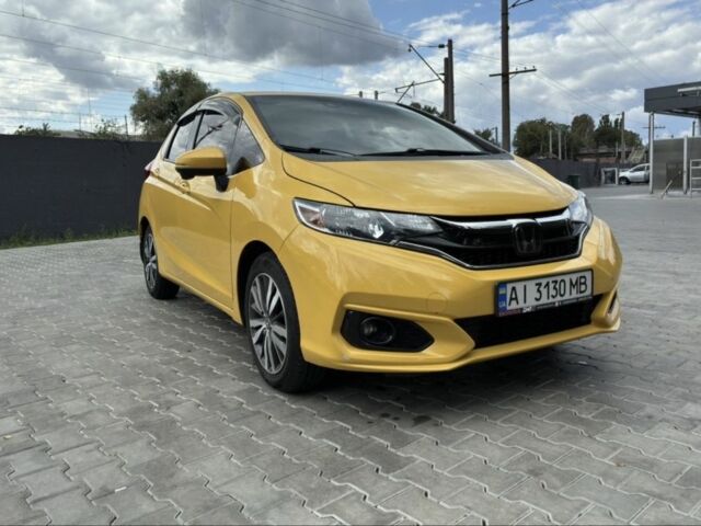 Желтый Хонда ФИТ, объемом двигателя 1.5 л и пробегом 136 тыс. км за 12000 $, фото 1 на Automoto.ua