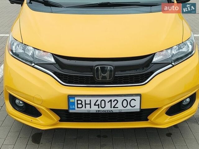 Желтый Хонда ФИТ, объемом двигателя 1.5 л и пробегом 135 тыс. км за 10000 $, фото 1 на Automoto.ua