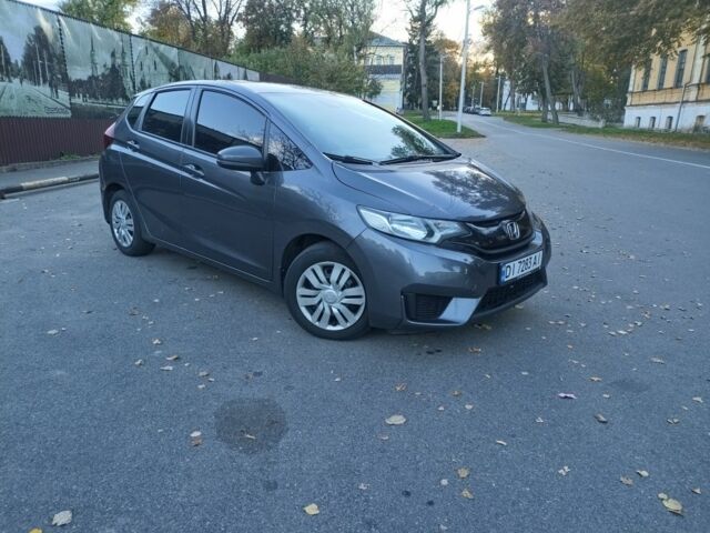 Сірий Хонда ФІТ, об'ємом двигуна 1.5 л та пробігом 167 тис. км за 8295 $, фото 1 на Automoto.ua