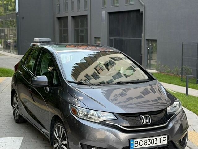 Сірий Хонда ФІТ, об'ємом двигуна 1.5 л та пробігом 163 тис. км за 9900 $, фото 1 на Automoto.ua