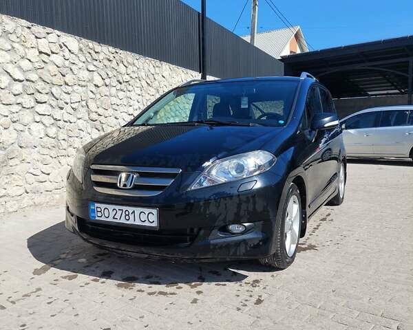 Черный Хонда ФРВ, объемом двигателя 1.8 л и пробегом 193 тыс. км за 6000 $, фото 1 на Automoto.ua