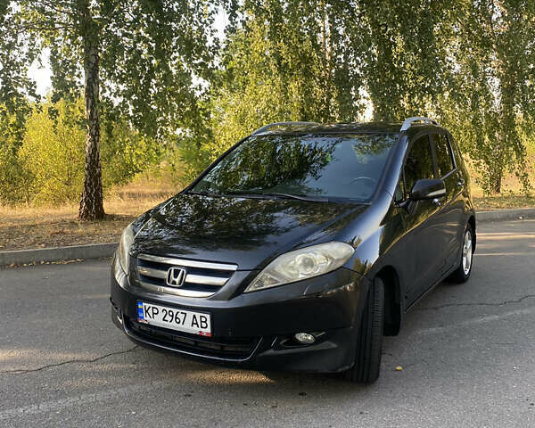 Черный Хонда ФРВ, объемом двигателя 1.8 л и пробегом 321 тыс. км за 5800 $, фото 1 на Automoto.ua