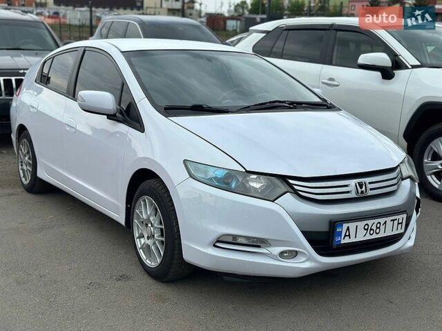 Белый Хонда Инсайт, объемом двигателя 1.4 л и пробегом 215 тыс. км за 4800 $, фото 1 на Automoto.ua