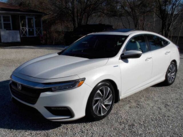 Белый Хонда Инсайт, объемом двигателя 1.5 л и пробегом 41 тыс. км за 6000 $, фото 1 на Automoto.ua