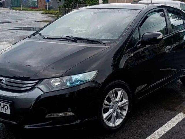 Чорний Хонда Інсайт, об'ємом двигуна 1.3 л та пробігом 199 тис. км за 7300 $, фото 1 на Automoto.ua