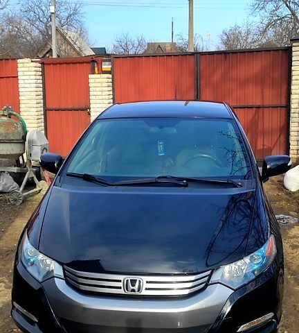 Черный Хонда Инсайт, объемом двигателя 1.3 л и пробегом 242 тыс. км за 7500 $, фото 1 на Automoto.ua