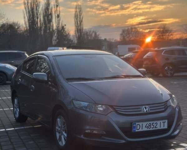 Черный Хонда Инсайт, объемом двигателя 1.34 л и пробегом 221 тыс. км за 6900 $, фото 1 на Automoto.ua