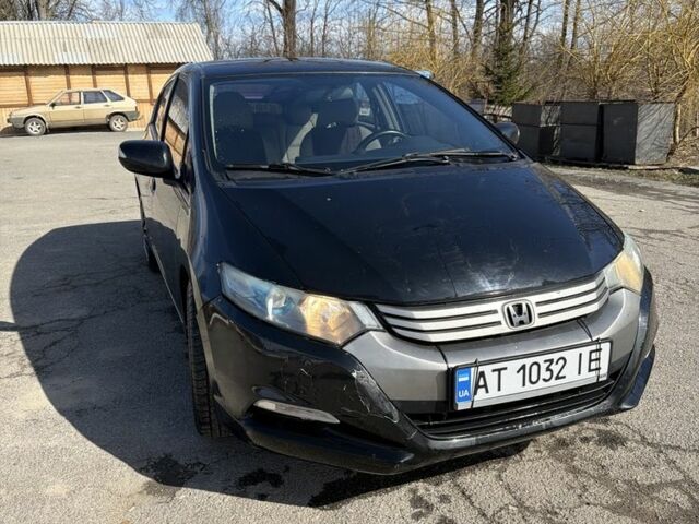 Черный Хонда Инсайт, объемом двигателя 1.3 л и пробегом 300 тыс. км за 6000 $, фото 1 на Automoto.ua