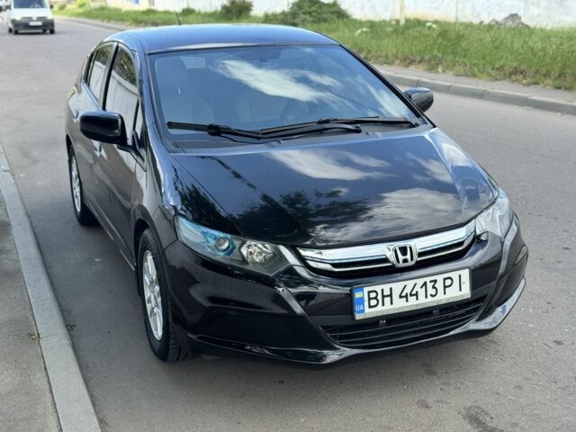 Черный Хонда Инсайт, объемом двигателя 1.3 л и пробегом 165 тыс. км за 7000 $, фото 1 на Automoto.ua