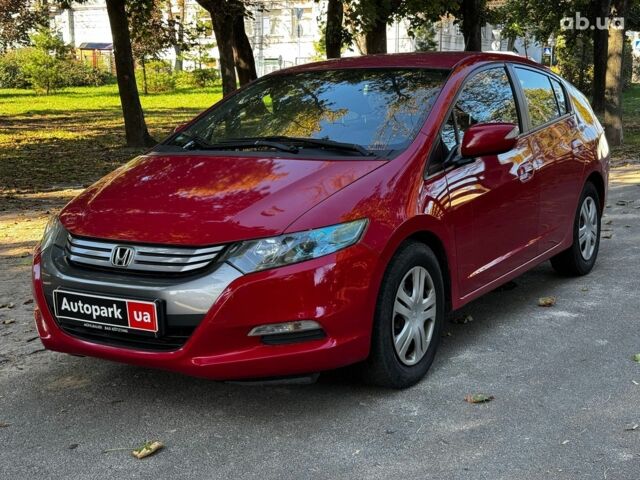 Красный Хонда Инсайт, объемом двигателя 1.3 л и пробегом 248 тыс. км за 6990 $, фото 1 на Automoto.ua