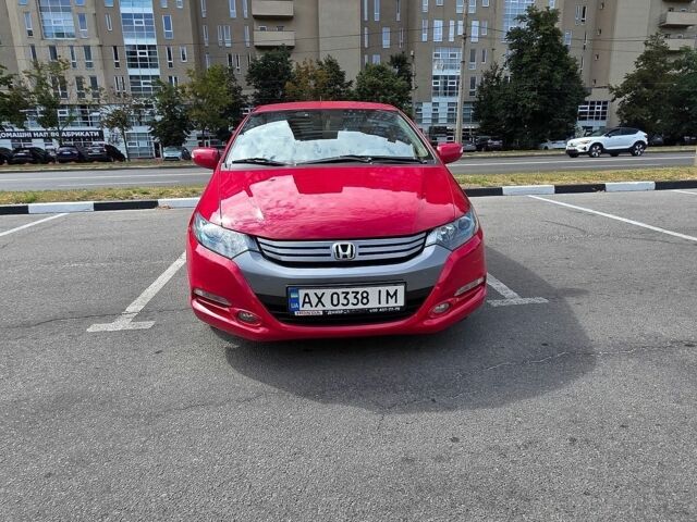 Червоний Хонда Інсайт, об'ємом двигуна 1.3 л та пробігом 123 тис. км за 7700 $, фото 1 на Automoto.ua