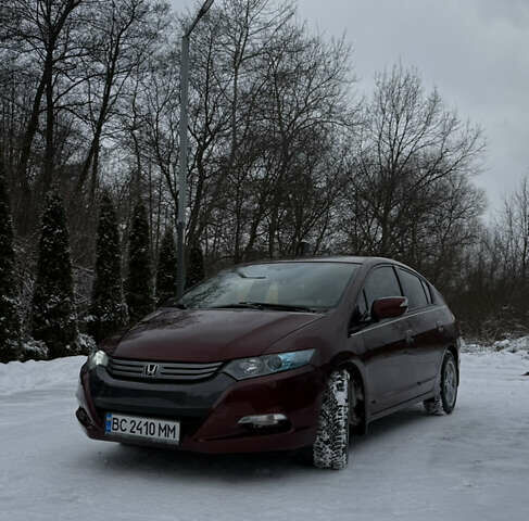 Красный Хонда Инсайт, объемом двигателя 1.34 л и пробегом 229 тыс. км за 6900 $, фото 1 на Automoto.ua