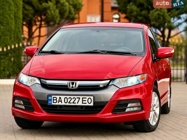 Червоний Хонда Інсайт, об'ємом двигуна 1.4 л та пробігом 209 тис. км за 8600 $, фото 1 на Automoto.ua
