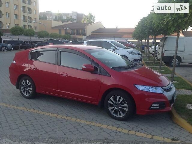 Червоний Хонда Інсайт, об'ємом двигуна 1.3 л та пробігом 108 тис. км за 9500 $, фото 1 на Automoto.ua