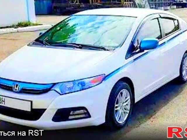 Хонда Инсайт, объемом двигателя 13 л и пробегом 250 тыс. км за 12000 $, фото 1 на Automoto.ua