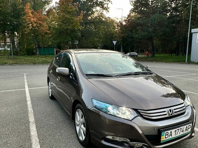 Серый Хонда Инсайт, объемом двигателя 1.3 л и пробегом 253 тыс. км за 6500 $, фото 1 на Automoto.ua