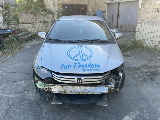 Сірий Хонда Інсайт, об'ємом двигуна 1.3 л та пробігом 338 тис. км за 4799 $, фото 1 на Automoto.ua