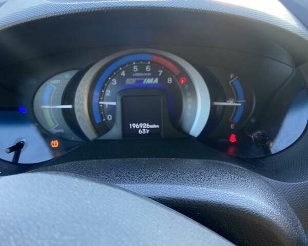 Серый Хонда Инсайт, объемом двигателя 1.34 л и пробегом 317 тыс. км за 5800 $, фото 1 на Automoto.ua