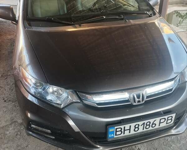 Серый Хонда Инсайт, объемом двигателя 1.3 л и пробегом 300 тыс. км за 7200 $, фото 1 на Automoto.ua