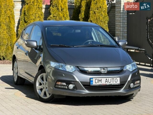 Серый Хонда Инсайт, объемом двигателя 1.3 л и пробегом 177 тыс. км за 10000 $, фото 1 на Automoto.ua