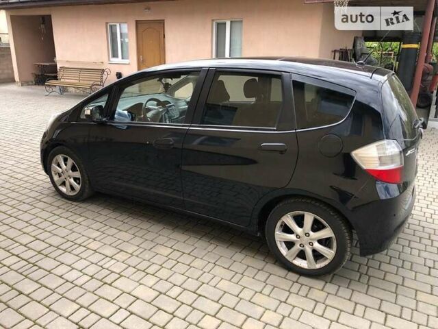 Черный Хонда Джаз, объемом двигателя 1.34 л и пробегом 230 тыс. км за 7150 $, фото 1 на Automoto.ua