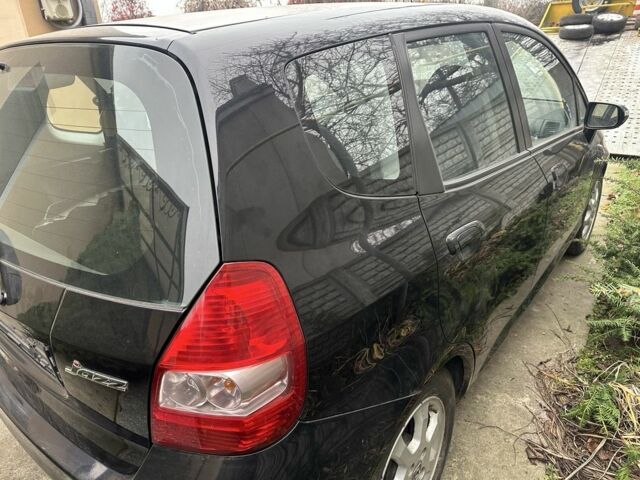 Черный Хонда Джаз, объемом двигателя 1.4 л и пробегом 200 тыс. км за 2600 $, фото 1 на Automoto.ua